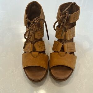 Never worn size 8.5 Sorel wedge sandal.